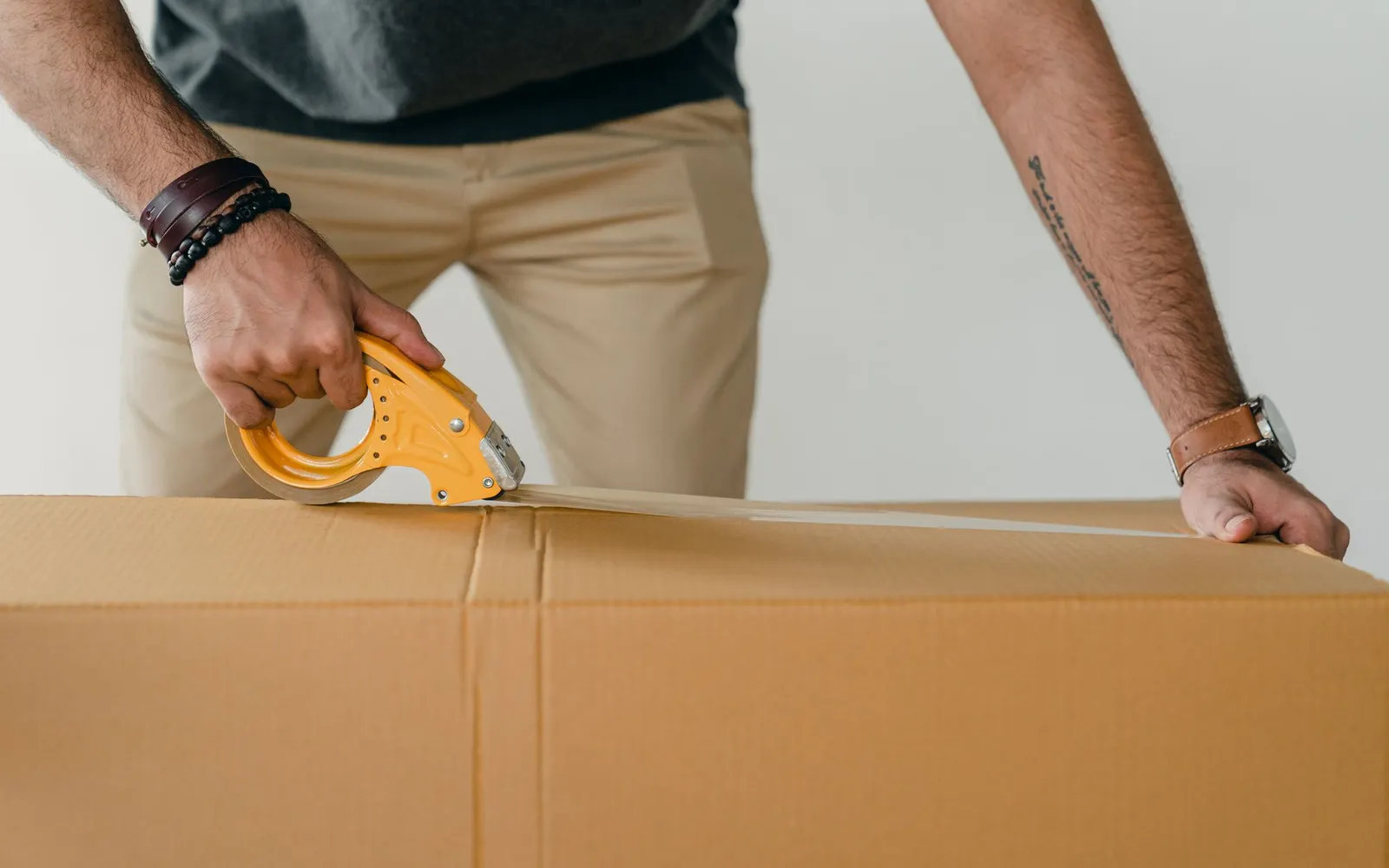 E-commerce seller packing orders for global shipping